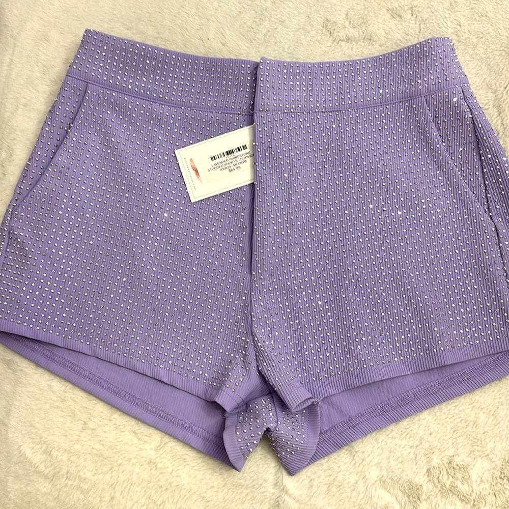 Medium size lilac rhinestone shorts.